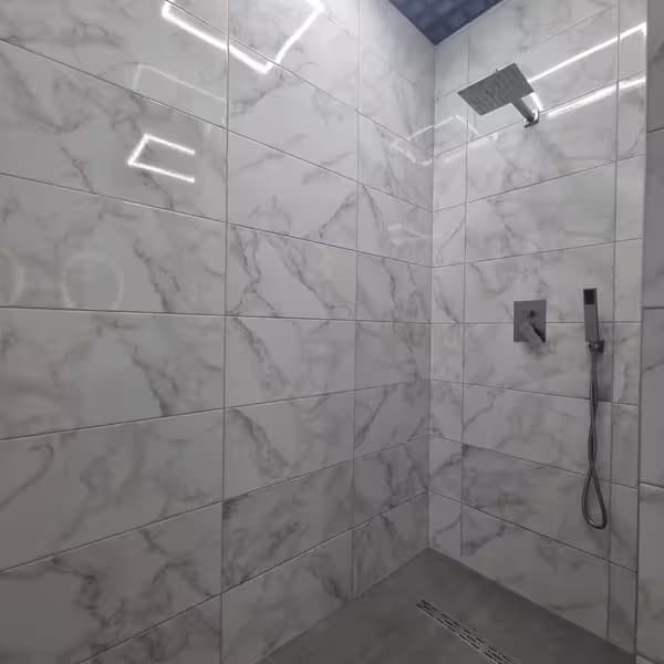 Clean modern bathroom at Aurinia XO Hostel